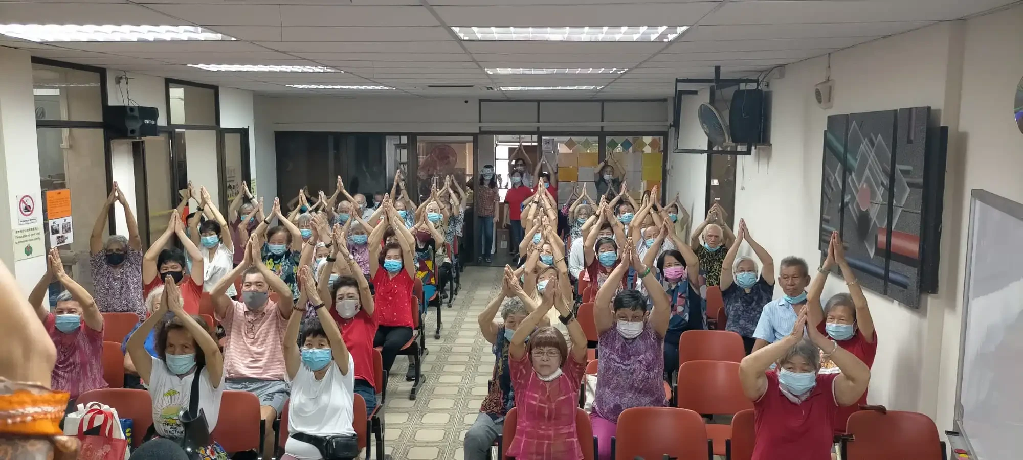 SWA and PetroChina volunteers distributing gifts to seniors during Chinese New Year 2023