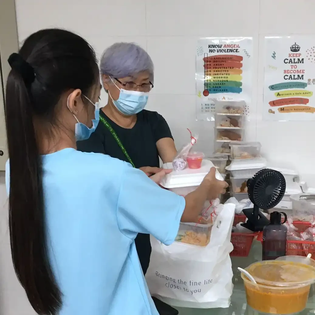 Project Rebuild International Women's Day celebration with shelter residents