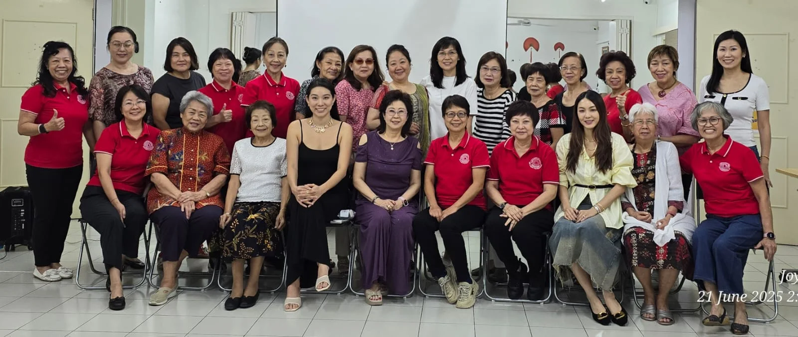 Singapore Women's Association community members engaged in volunteer activities